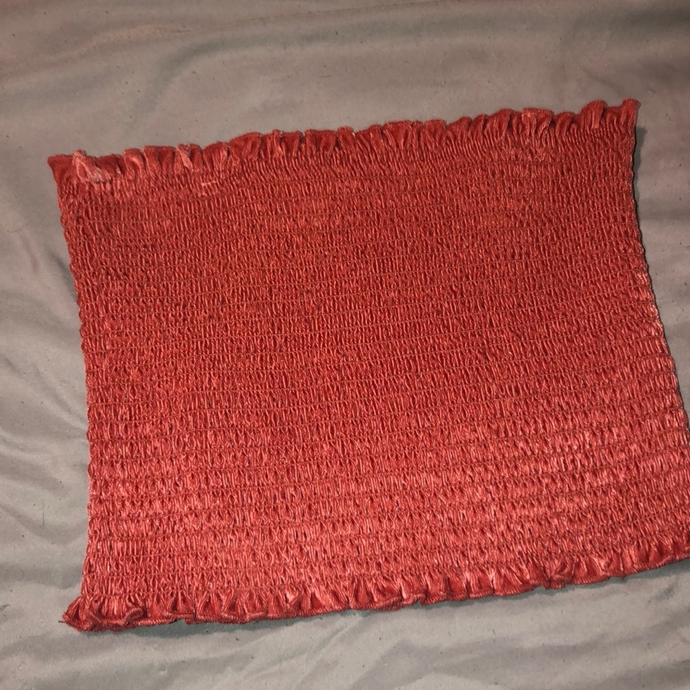 I am selling this hollister tube top the color is a reddish pink